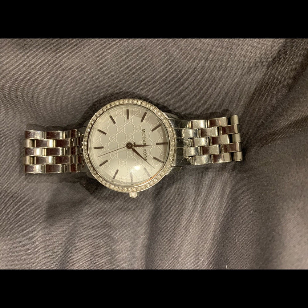 Women’s silver Micheal Kors watch